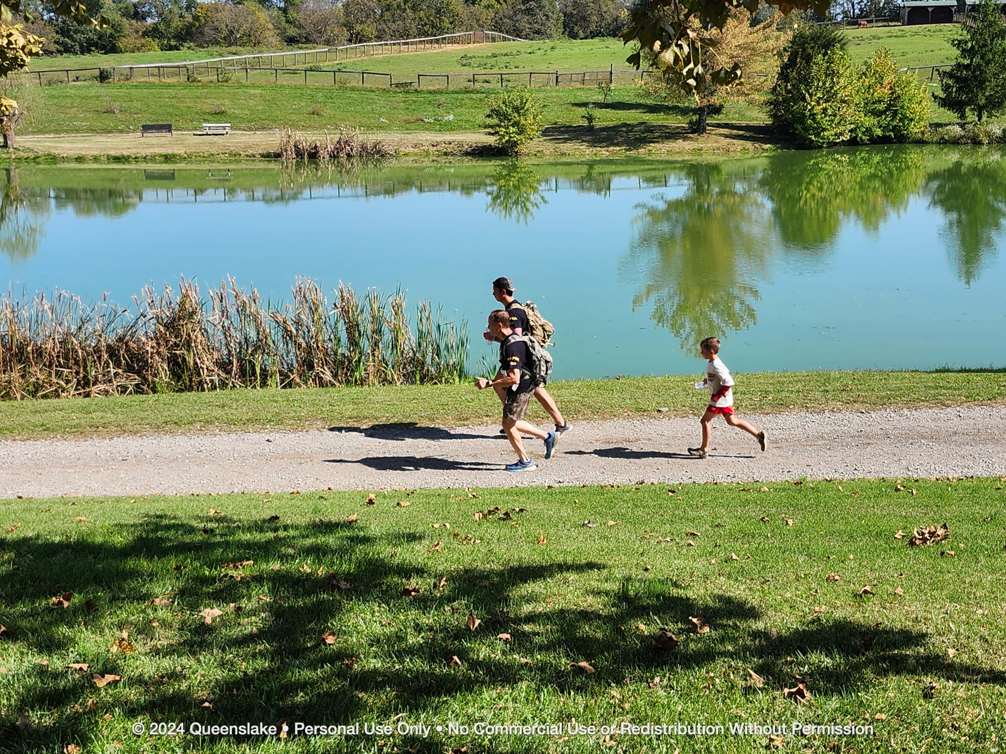 Jim Yacone and teammates traversing the course behind the Queenslake main residence.