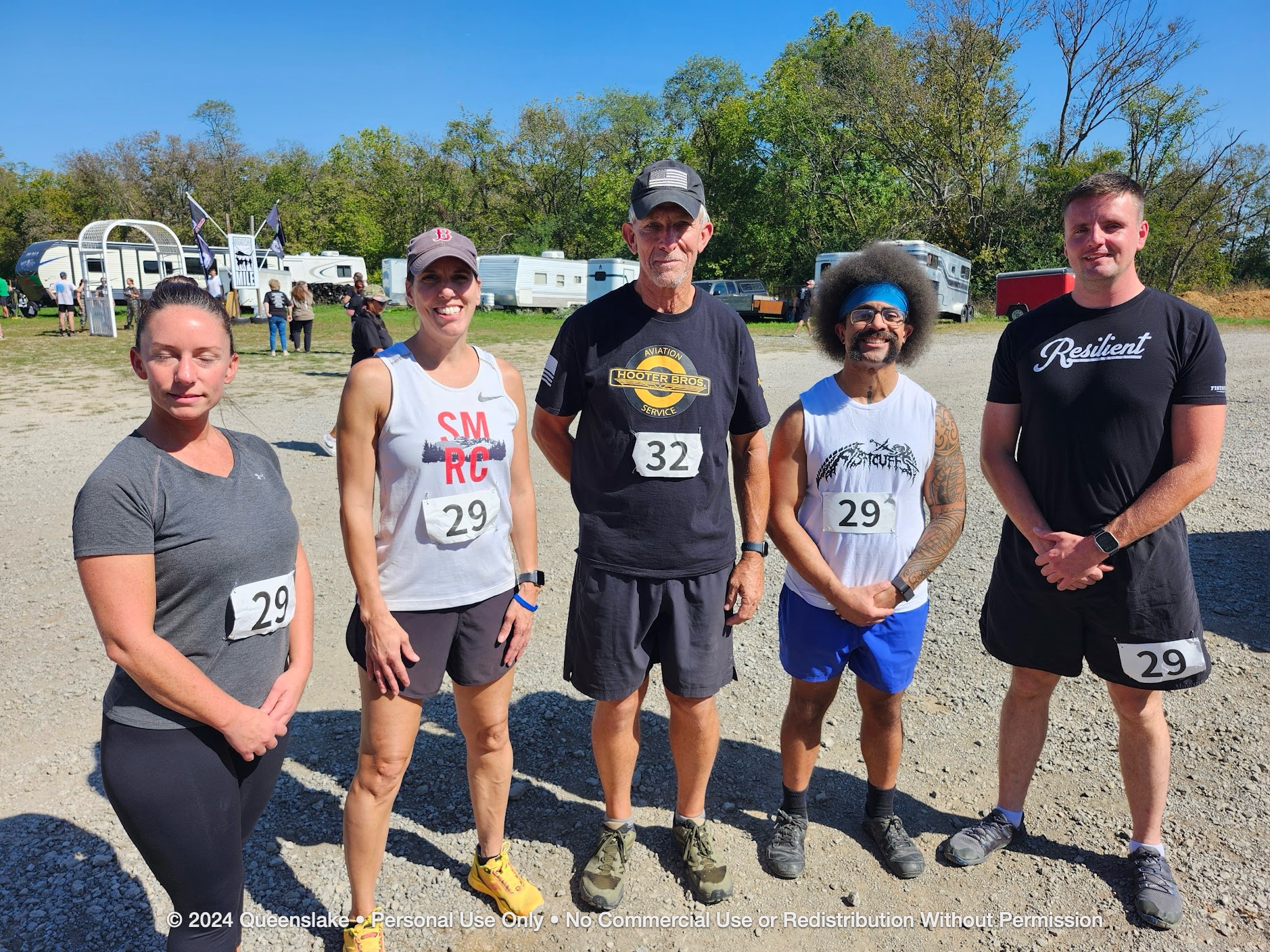 CW4 Dan Jollota teaming with adaptive warrior Marcus on the Queenslake challenge trail.