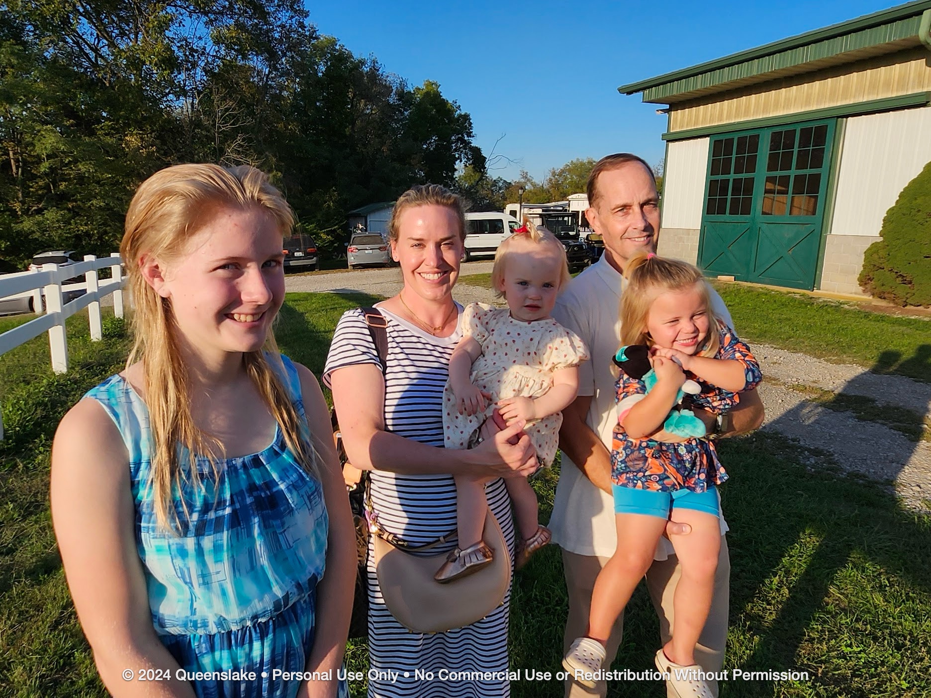 Jim Yacone and family with host John Chmela's daughters Hunter and Aspen enjoying the serene 140-acre grounds of Queenslake.