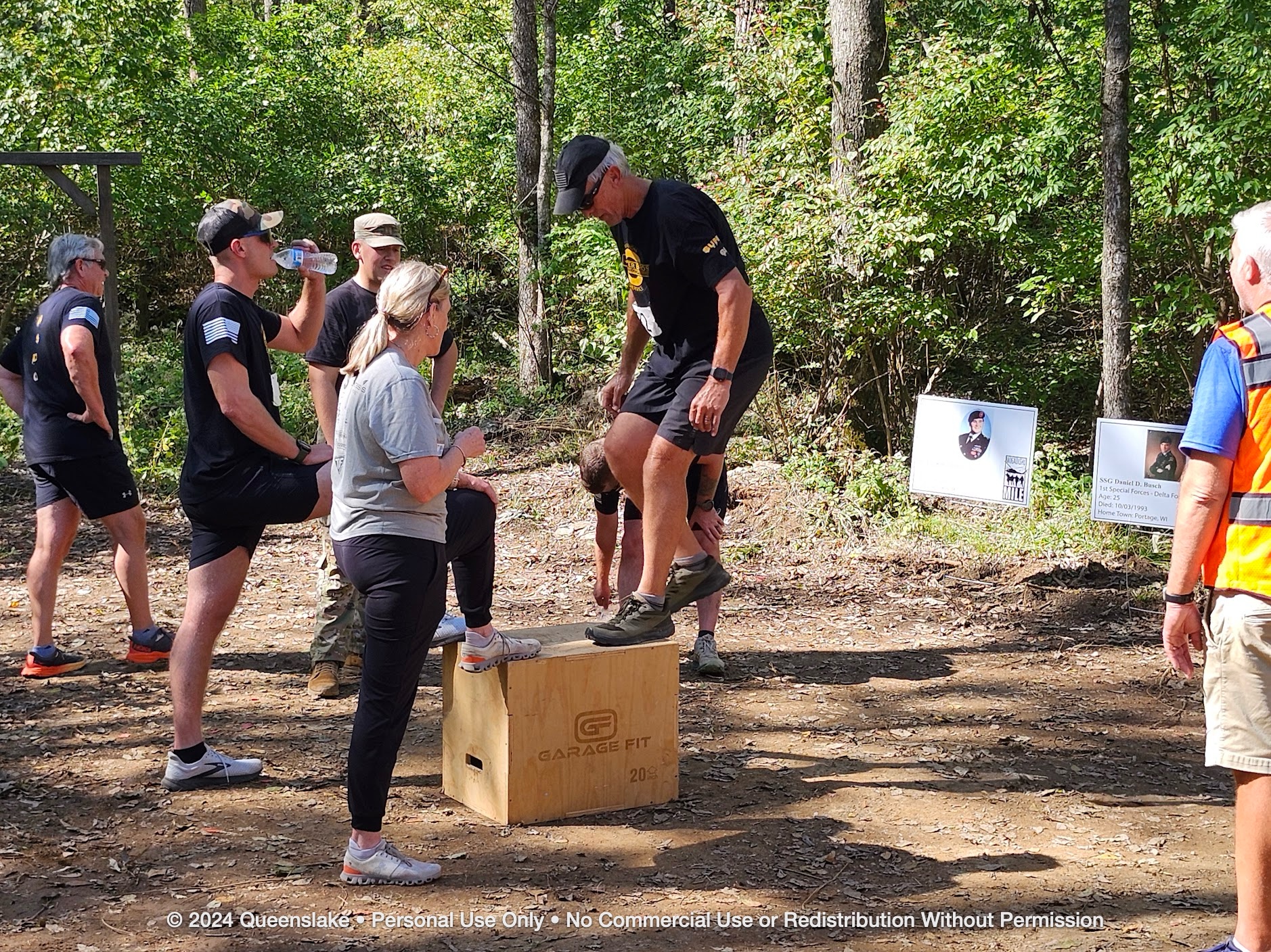 CW4 Dan Jollota and teammates executing explosive box jumps at the tactical fitness crucible.