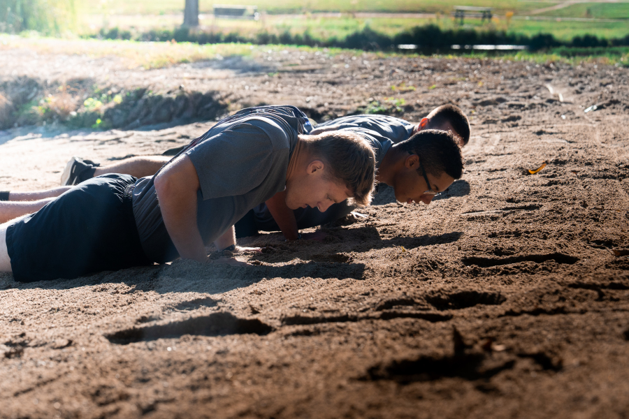 Cadet Pushups Inches Above Beach Sand