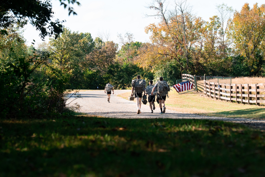 2026 Athletes Emerging from Wooded Trail into Pasture Road